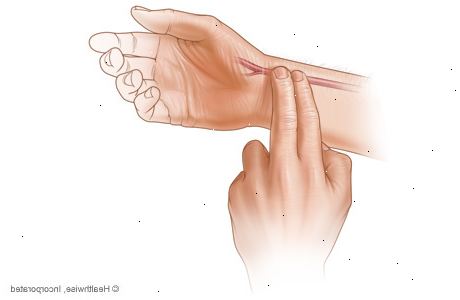 Hur du kontrollerar pulsen. Använd fingrarna när att hitta en puls.