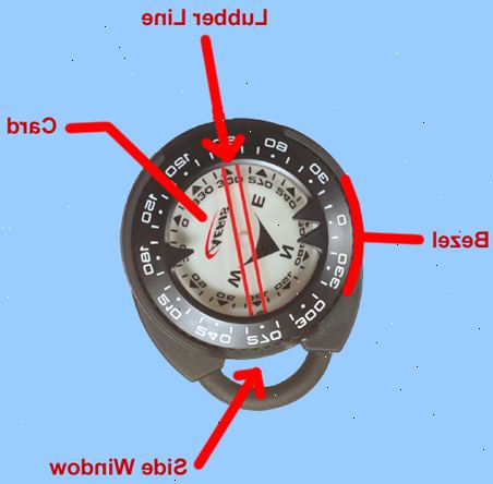 Hur man använder en undervattens kompass. Fortfarande på båten, satte styrstrecket (fast röda linjen) i riktning mot din destination eller parallellt med kustlinjen där du anger vattnet (om det behövs endast som en allmän orientering).
